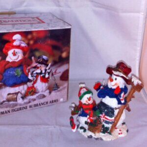 Winter Snowman Figurine -- Father and Son putting up holiday decor